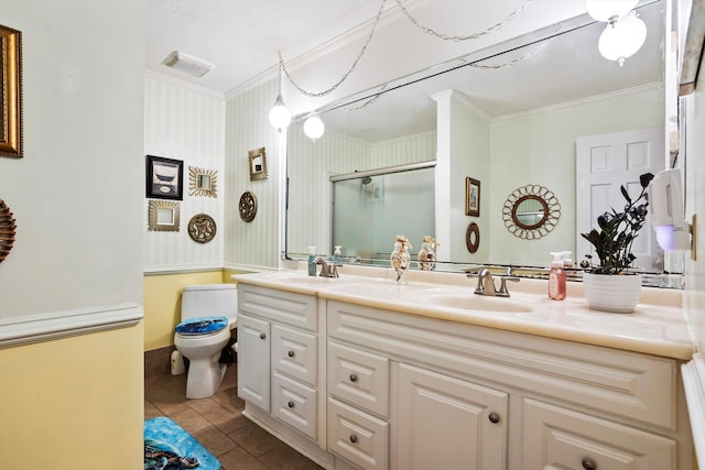 full bath with ornamental molding, tile patterned flooring, a sink, and a shower stall