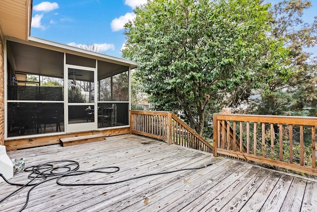 deck with a sunroom