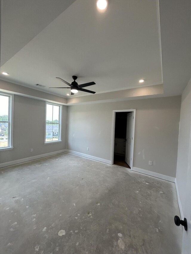 410 Williams St, Grovetown, GA 30813 - unfurnished bedroom featuring a tray ceiling, baseboards, and recessed lighting