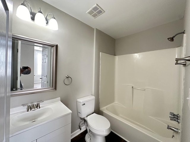 full bathroom with vanity, toilet, and shower / washtub combination