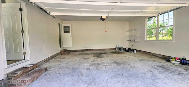 1306 Dominica Dr, Augusta, GA 30909 - garage featuring a garage door opener and baseboards
