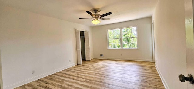 1306 Dominica Dr, Augusta, GA 30909 - empty room featuring wood finished floors, ceiling fan, and baseboards