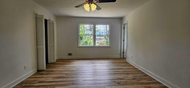 1306 Dominica Dr, Augusta, GA 30909 - unfurnished bedroom featuring wood finished floors, baseboards, and ceiling fan