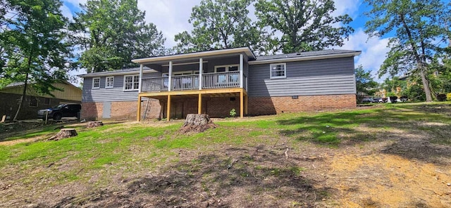 1306 Dominica Dr, Augusta, GA 30909 - back of property with a wooden deck and crawl space