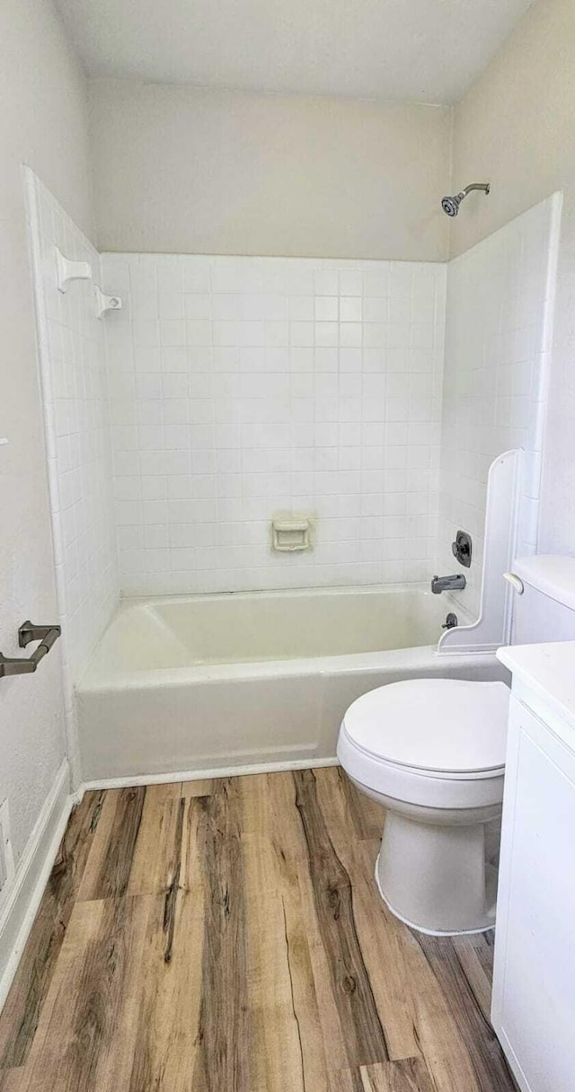 1306 Dominica Dr, Augusta, GA 30909 - full bathroom with wood finished floors, toilet, vanity, and bathtub / shower combination