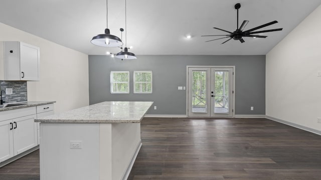 4593 Windsor Spring Rd, Hephzibah, GA 30815 - kitchen featuring open floor plan, plenty of natural light, and ceiling fan