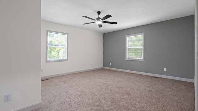 4593 Windsor Spring Rd, Hephzibah, GA 30815 - carpeted spare room featuring plenty of natural light and ceiling fan