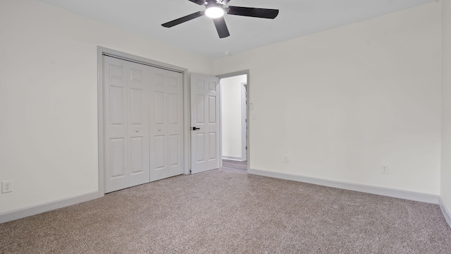 4593 Windsor Spring Rd, Hephzibah, GA 30815 - unfurnished bedroom featuring carpet, a closet, and a ceiling fan