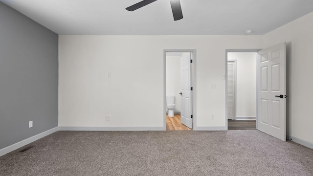 4593 Windsor Spring Rd, Hephzibah, GA 30815 - unfurnished bedroom featuring carpet, ensuite bath, and a ceiling fan