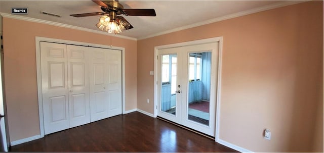 unfurnished bedroom with ceiling fan, french doors, dark hardwood / wood-style floors, a closet, and ornamental molding