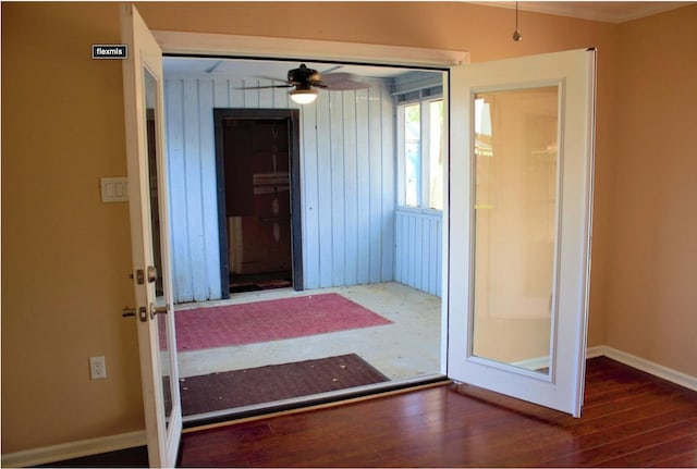 entryway featuring ceiling fan and dark hardwood / wood-style flooring