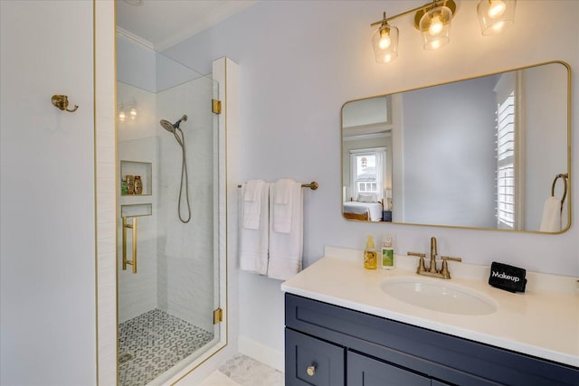 ensuite bathroom with a shower stall, ensuite bathroom, and vanity