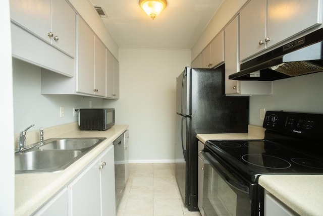 kitchen featuring black appliances, light tile patterned flooring, white cabinets, and sink