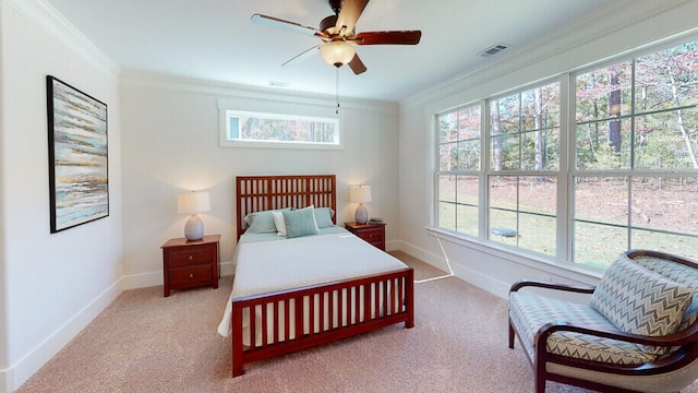 151 Cypress Dr, Mccormick, SC 29835 - carpeted bedroom with multiple windows, ornamental molding, and ceiling fan