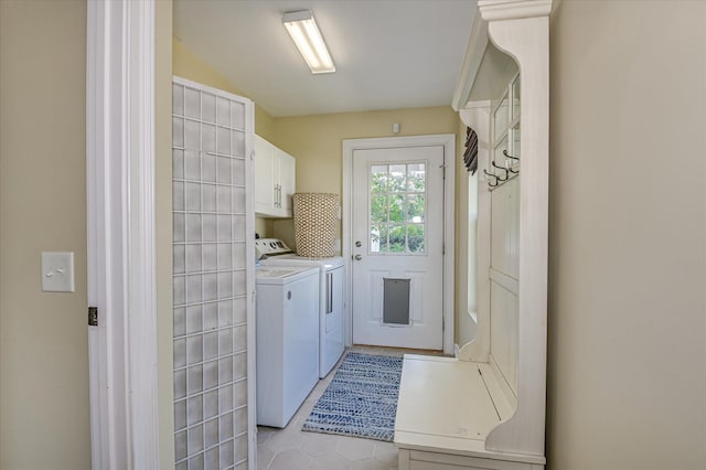 2010 Battle, Augusta, GA 30904 - laundry room with cabinet space, washer and dryer, and light tile patterned flooring