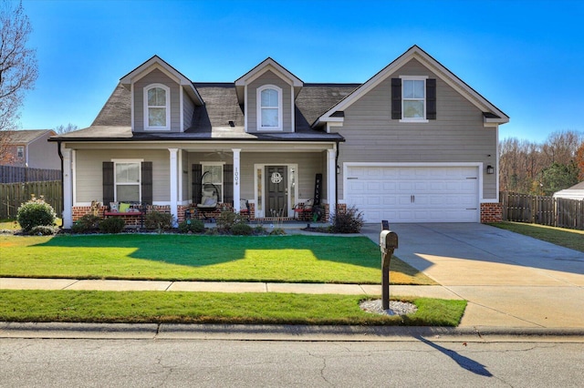 view of front facade with a front lawn and a garage