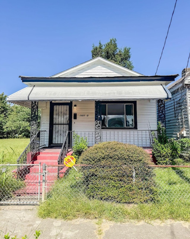 bungalow-style house featuring covered porch