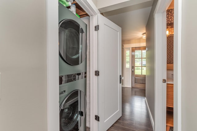 1 Partridge Ct, Aiken, SC 29803 - laundry room featuring stacked washer and clothes dryer and dark wood-type flooring