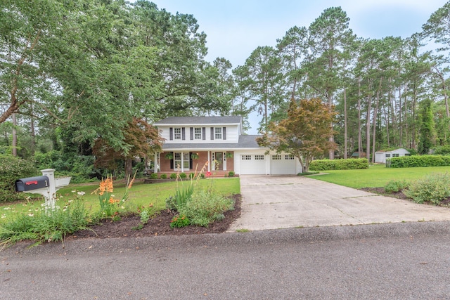 1 Partridge Ct, Aiken, SC 29803 - traditional home featuring covered porch, a front yard, concrete driveway, and an attached garage