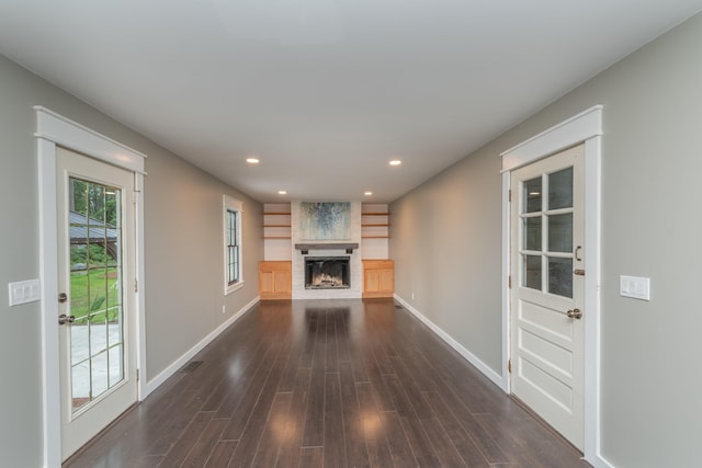 1 Partridge Ct, Aiken, SC 29803 - unfurnished living room with dark wood finished floors, recessed lighting, and a fireplace