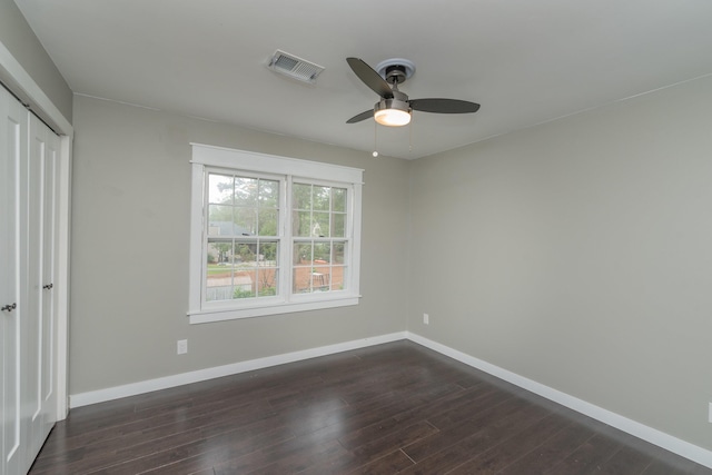 1 Partridge Ct, Aiken, SC 29803 - unfurnished bedroom with a closet, dark wood finished floors, and a ceiling fan