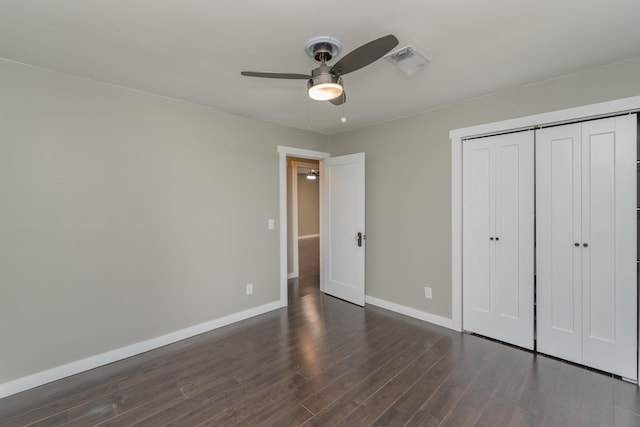 1 Partridge Ct, Aiken, SC 29803 - unfurnished bedroom with dark wood-style flooring, a closet, and a ceiling fan