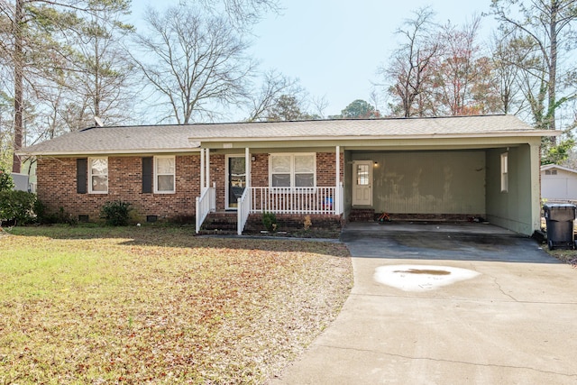 ranch-style house featuring covered porch, brick siding, driveway, and crawl space