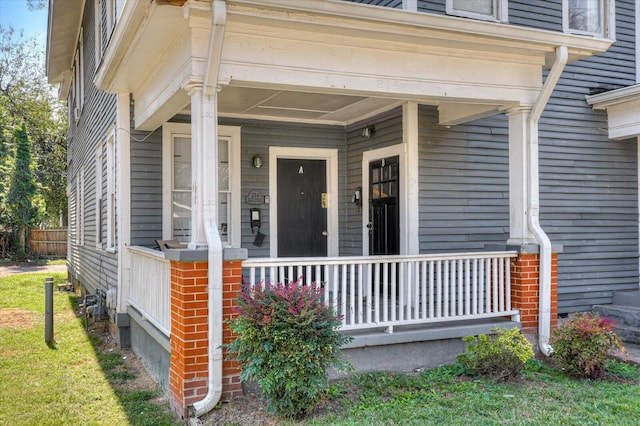 entrance to property with covered porch