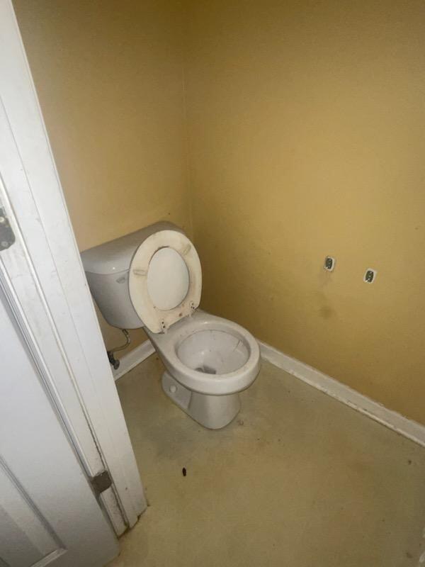 bathroom featuring toilet