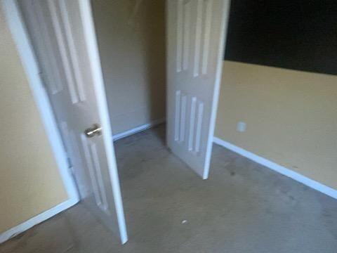 unfurnished bedroom featuring a closet