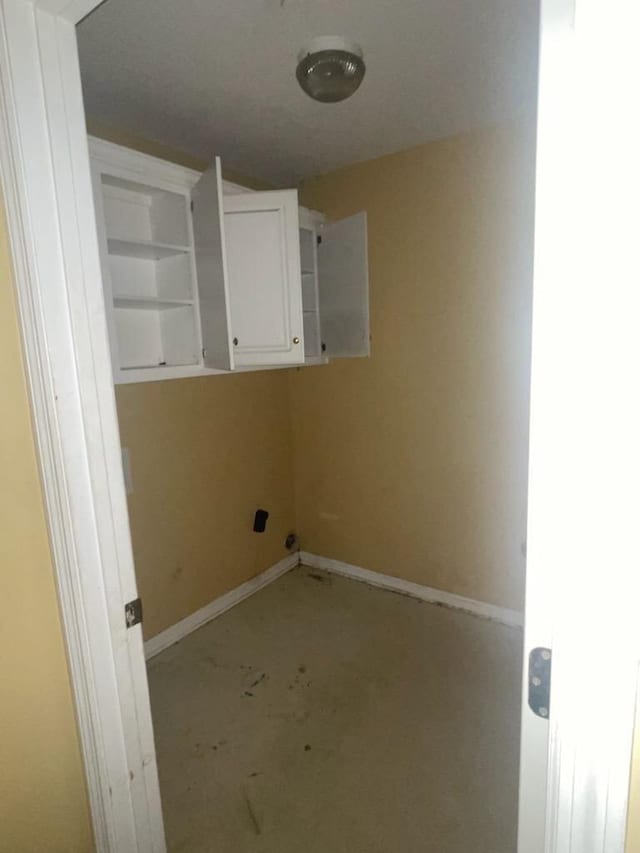 washroom featuring cabinets