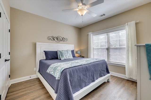 186 Tara Dr, Mccormick, SC 29835 - bedroom with baseboards, ceiling fan, visible vents, and wood finished floors