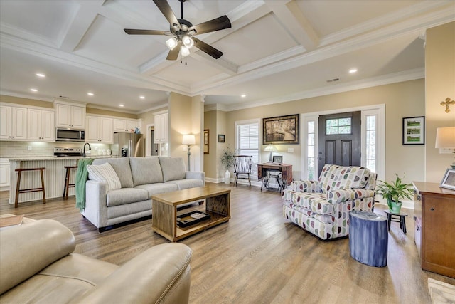 186 Tara Dr, Mccormick, SC 29835 - living room featuring beamed ceiling, light wood-style floors, ceiling fan, and coffered ceiling