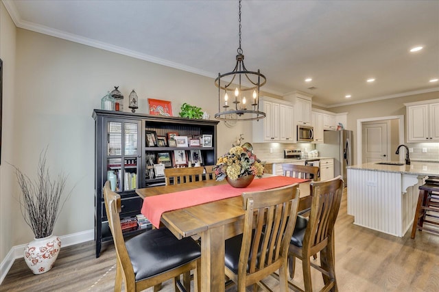 186 Tara Dr, Mccormick, SC 29835 - dining space featuring crown molding and light wood-type flooring