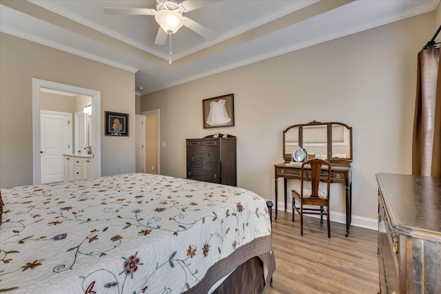 186 Tara Dr, Mccormick, SC 29835 - bedroom featuring wood finished floors, crown molding, ensuite bathroom, baseboards, and a raised ceiling