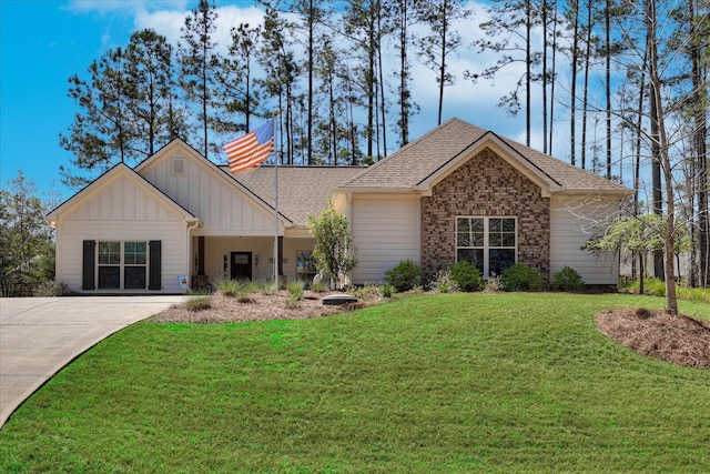 186 Tara Dr, Mccormick, SC 29835 - view of front of property featuring a shingled roof, a front lawn, and board and batten siding