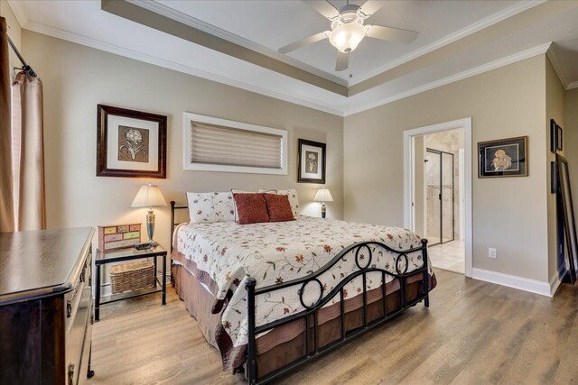 186 Tara Dr, Mccormick, SC 29835 - bedroom featuring crown molding, wood finished floors, baseboards, and a raised ceiling
