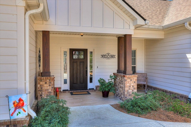 186 Tara Dr, Mccormick, SC 29835 - entrance to property featuring covered porch, roof with shingles, and board and batten siding
