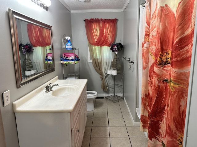 bathroom with tile patterned floors, a textured ceiling, toilet, vanity, and ornamental molding