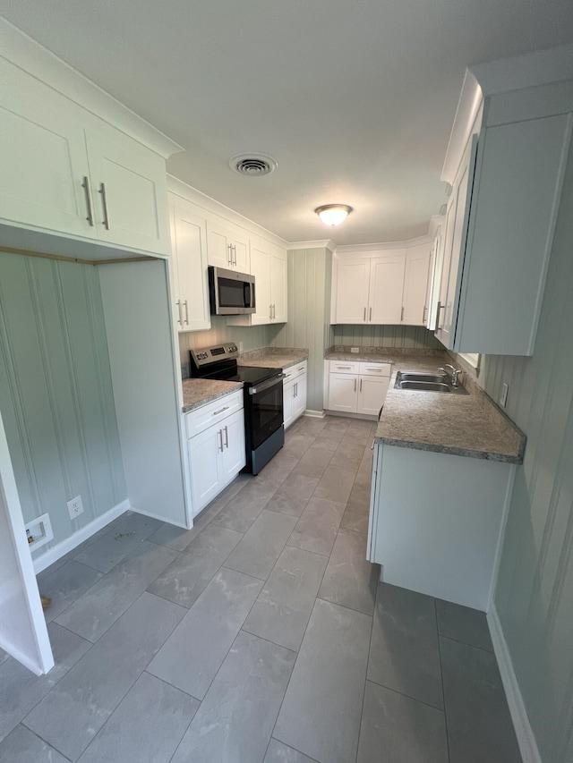 202 Hillview Dr, Graniteville, SC 29829 - kitchen featuring stainless steel appliances, white cabinets, and stone counters