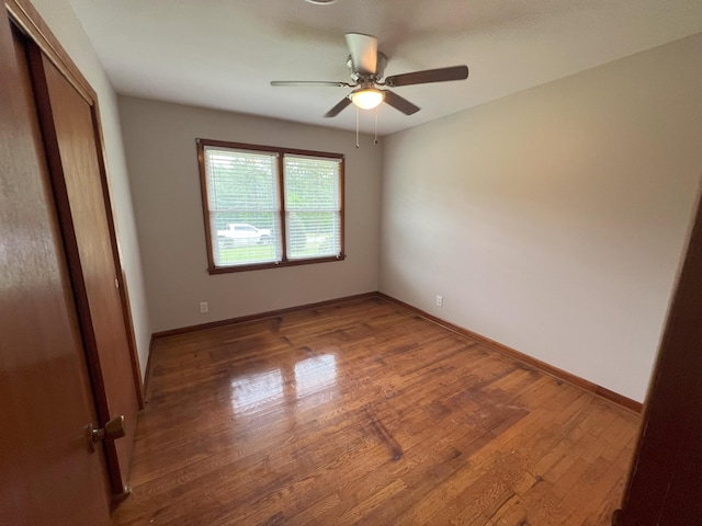 202 Hillview Dr, Graniteville, SC 29829 - unfurnished bedroom with wood finished floors, a closet, and ceiling fan