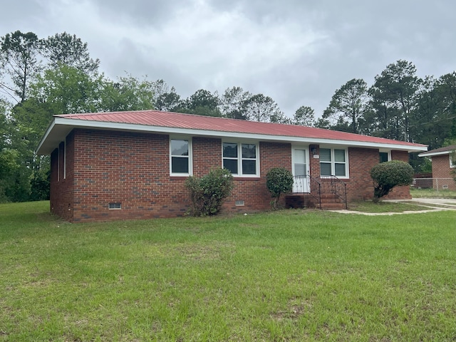 202 Hillview Dr, Graniteville, SC 29829 - single story home featuring crawl space, a metal roof, a front yard, and brick siding