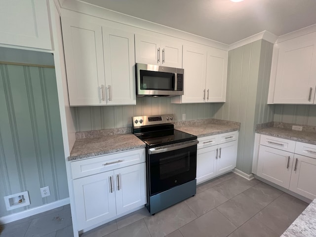 202 Hillview Dr, Graniteville, SC 29829 - kitchen with stainless steel appliances, white cabinets, and light stone countertops