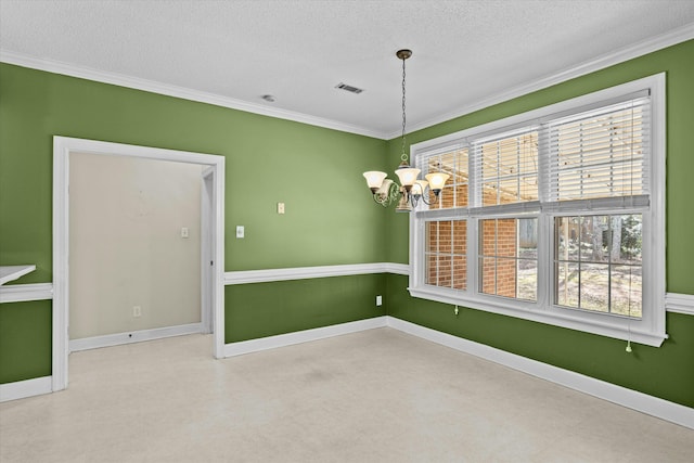 spare room with tile patterned floors, visible vents, ornamental molding, baseboards, and a chandelier