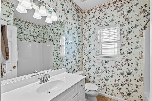 full bath with tile patterned floors, toilet, wallpapered walls, a shower, and vanity