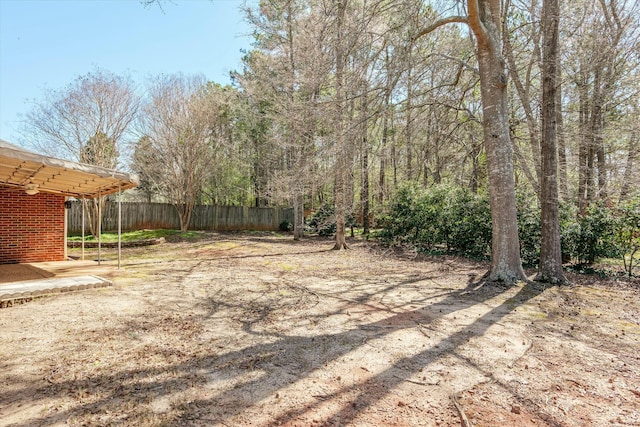 view of yard with fence