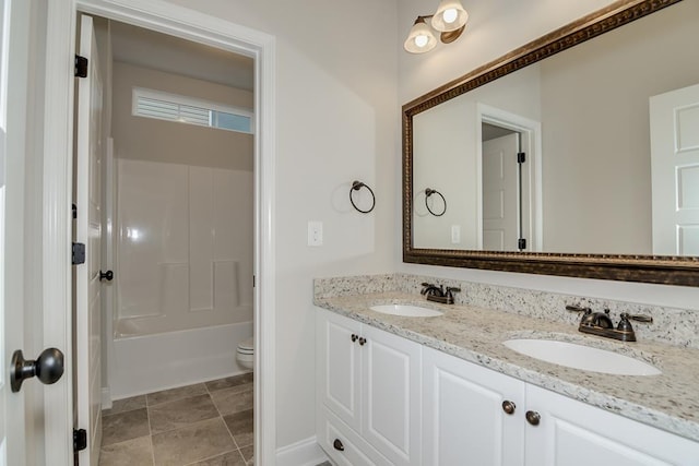 full bathroom with vanity, shower / bathing tub combination, and toilet