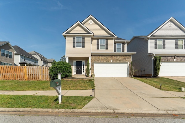 631 Dunrobin Ln, Grovetown, GA 30813 - view of front of home with an attached garage, concrete driveway, stone siding, and a residential view
