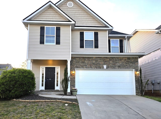 631 Dunrobin Ln, Grovetown, GA 30813 - view of front of house featuring a garage, concrete driveway, and stone siding