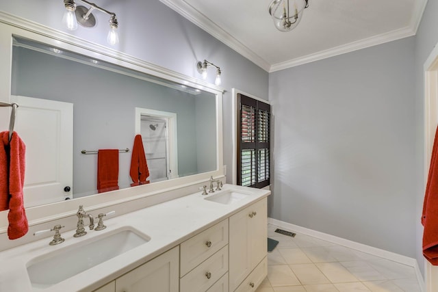 574 SW Newberry St, Aiken, SC 29801 - bathroom featuring ornamental molding, double vanity, and tile patterned floors